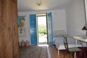 Ένα ή περισσότερα κρεβάτια σε δωμάτιο στο Casa Zinda