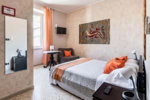 Postel nebo postele na pokoji v ubytování Vecchio Treno guest house