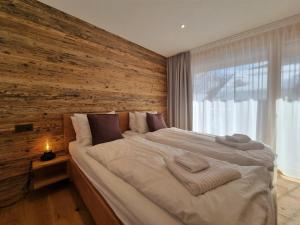 Postel nebo postele na pokoji v ubytování Berghof 2nd Floor