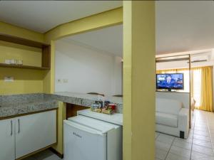 Η κουζίνα ή μικρή κουζίνα στο Aparthotel Beira Mar no Centro