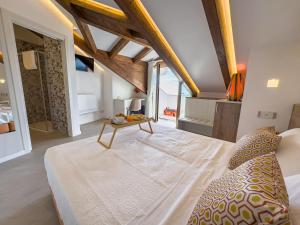 Giường trong phòng chung tại Le Perseidi