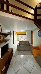 Posezení v ubytování Apê Village 1