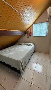 Postel nebo postele na pokoji v ubytování Apê Village 1