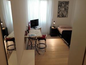 TV a/nebo společenská místnost v ubytování B&B Rosa Blu