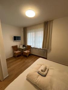 Postel nebo postele na pokoji v ubytování Hotel Wolbeck