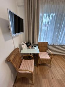 TV a/nebo společenská místnost v ubytování Hotel Wolbeck