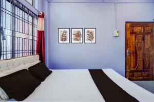 Postel nebo postele na pokoji v ubytování Hotel O Dream Lodge