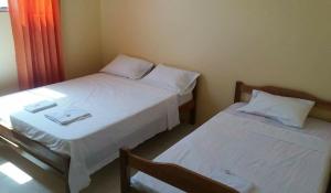Letto o letti in una camera di Hostal Montecarlos