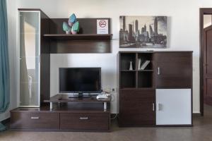 TV a/nebo společenská místnost v ubytování El Dorado, Ocean View & Wifi Free