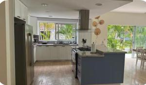 Η κουζίνα ή μικρή κουζίνα στο Portillo Beach Family House +8 φωτογραφίες