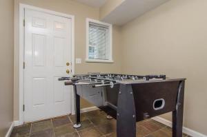 a kitchen with a stove top in a room at Union Cove 3-Plex in Salt Lake with Hot Tub in Midvale