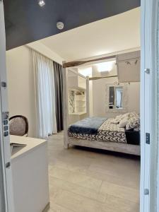 Η κουζίνα ή μικρή κουζίνα στο Hotel Madalù