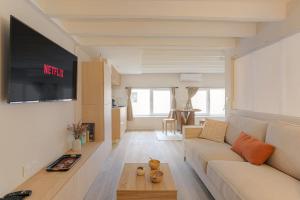 Μια τηλεόραση ή/και κέντρο ψυχαγωγίας στο Cosy et Design Brotteaux - Massena