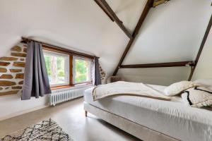 Postel nebo postele na pokoji v ubytování Chaumiere bretonne avec jardin - Golfe du Morbihan