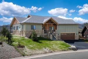 a large house with a house at Saddle Ridge in Granby