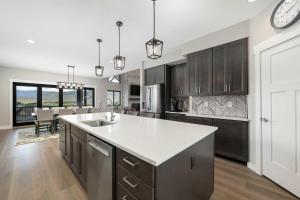 a kitchen with a sink and a counter top at Saddle Ridge in Granby