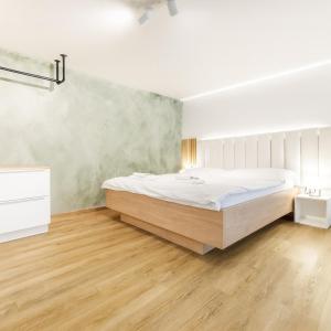 Ένα ή περισσότερα κρεβάτια σε δωμάτιο στο Apartmán Dub