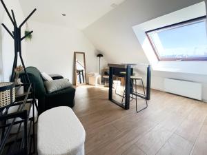 Χώρος καθιστικού στο Studio lumineux et rénové - 2 personnes