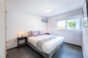 Ένα ή περισσότερα κρεβάτια σε δωμάτιο στο Casa di Mama - Ground floor 2-bedroom