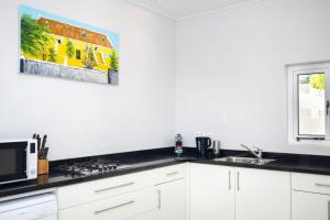 Η κουζίνα ή μικρή κουζίνα στο Casa di Mama - Ground floor 2-bedroom +27 φωτογραφίες