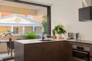 Dapur atau dapur kecil di Island Time Retreat