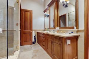 a bathroom with a sink and a shower at Aspen Meadows Resort 111 in Aspen +18 photos
