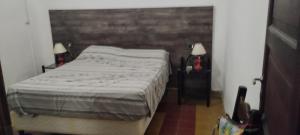 Postel nebo postele na pokoji v ubytování Alojamiento Perú