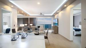 TV a/nebo společenská místnost v ubytování 2 BDR Encantame Towers Viento 2004