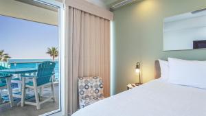 Ένα ή περισσότερα κρεβάτια σε δωμάτιο στο Amazing Beach Front Condo Velero 204 at Encantame Towers +24 φωτογραφίες