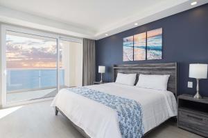 Voodi või voodid majutusasutuse Splash in New Lazy River/Stay in Modern Luxury Encantame C-705 toas +33 fotot