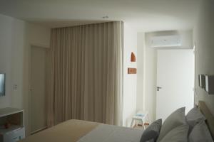 TV a/nebo společenská místnost v ubytování Casa Aia