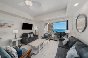 a living room with a view of the ocean at 1BR 1BA Ocean View Las Palomas Phase 1 Bld Ruby in Puerto Peñasco