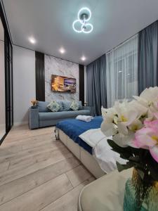 Posezení v ubytování Сердце города & City Center