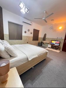 Χώρος καθιστικού στο Luxury Rooms in Al Mouj Street - Excellent Location غرف فندقية راقية في شارع الموج - موقع مميز