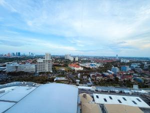 a view of a city from the top of a building at La Vida II at Anderson Tower in Surabaya