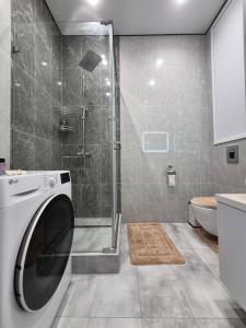 Koupelna v ubytování Сердце города & City Center + 41 fotografií