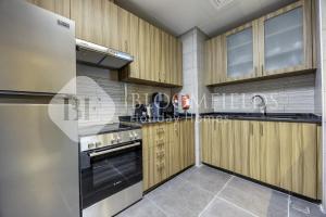 Η κουζίνα ή μικρή κουζίνα στο Bloomfields 1Br Comfort Stay Ajwan Soul Beach