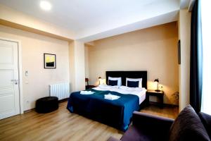 Postel nebo postele na pokoji v ubytování Hotel Avlabari Terrace