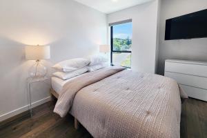 Postel nebo postele na pokoji v ubytování New Townhouse! Hot Tub! Dog Friendly! Salt and Stone + 9 fotografií