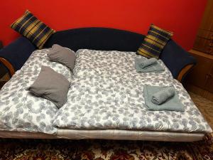 Ένα ή περισσότερα κρεβάτια σε δωμάτιο στο AJME apartmán