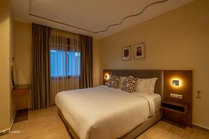 Ένα ή περισσότερα κρεβάτια σε δωμάτιο στο Ain Chaouen +12 φωτογραφίες