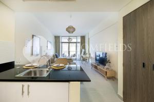 Η κουζίνα ή μικρή κουζίνα στο Bloomfileds Cozy Stu in Park View +10 φωτογραφίες