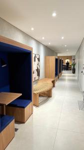 Posezení v ubytování Wood One - Apto com varanda e Fácil acesso ao Metrô e Expo Imigrantes + 9 fotografií