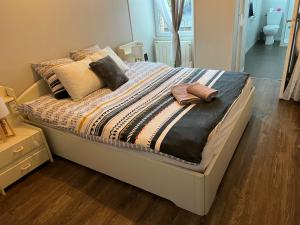 Postel nebo postele na pokoji v ubytování Jasmin