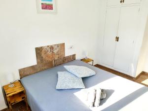 Ένα ή περισσότερα κρεβάτια σε δωμάτιο στο Encantador Estudio en Altea