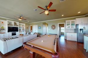 a living room with a pool table in it at Ultimate Ocean Views Game Room Dog Haven in Bolivar Peninsula