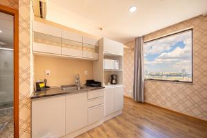 Kuchyň nebo kuchyňský kout v ubytování Hospedez - Flat Osasco Trade Center