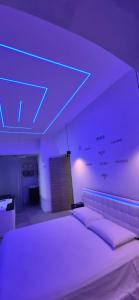 Ένα ή περισσότερα κρεβάτια σε δωμάτιο στο Costantinopoli Suite