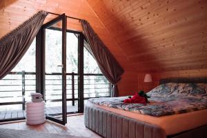 Postel nebo postele na pokoji v ubytování Black Resort Balia Sauna