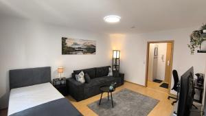 Χώρος καθιστικού στο Tolle Lage - modern - zentral gelegen - 2 Zimmer Apartment